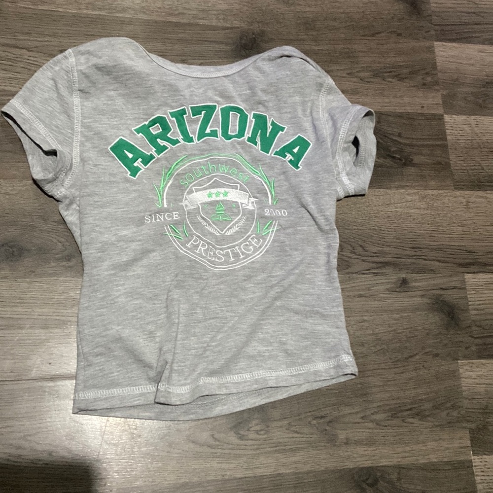 19" length (size small). Machine wash. 60% cotton, 40% polyester.